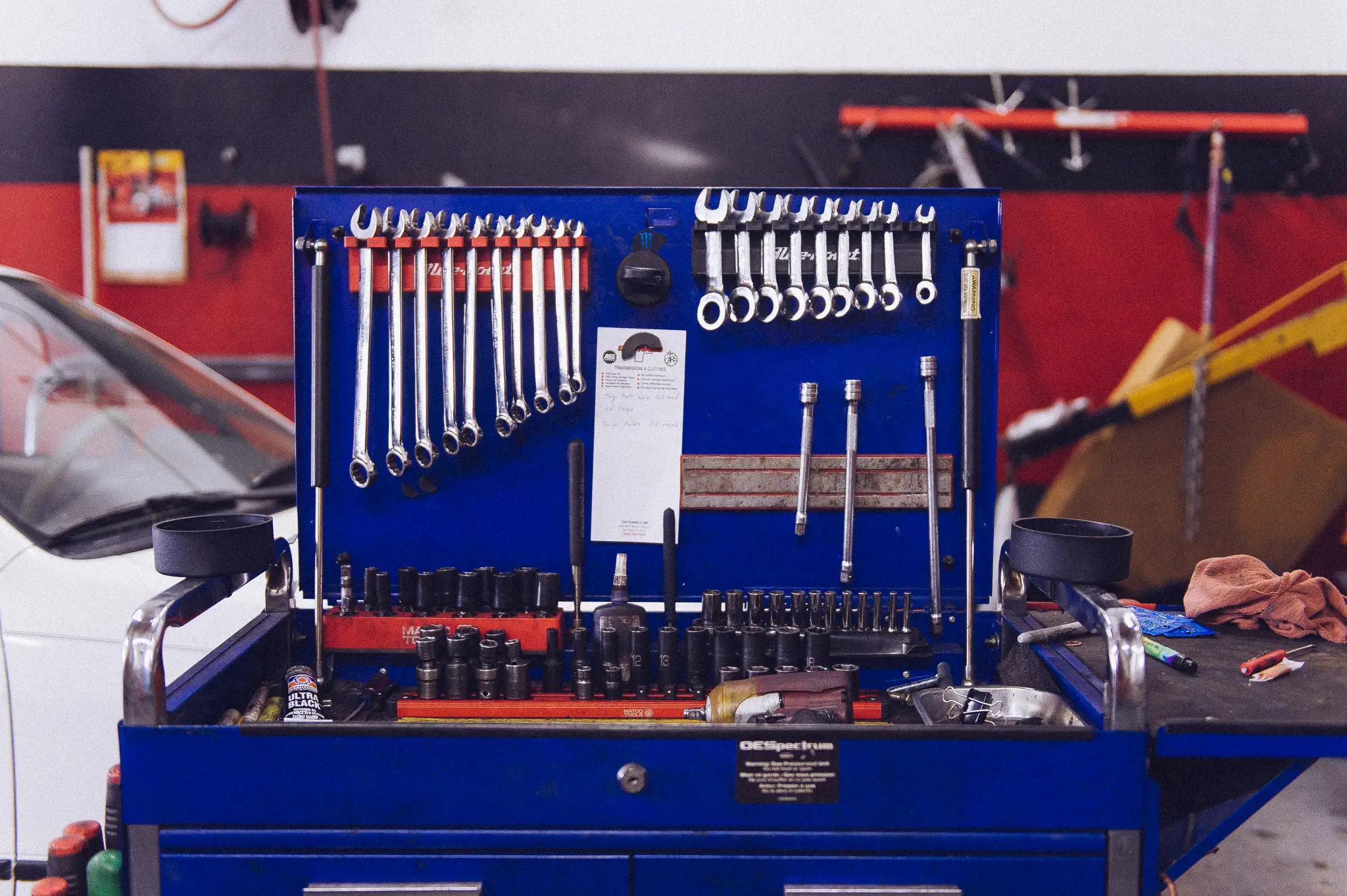 Professional wrench and socket set organized on tool board